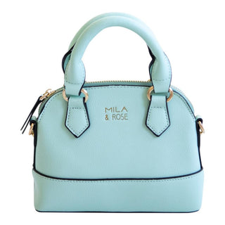Mint green pebbled faux leather dome purse for children with gold branding and black piping