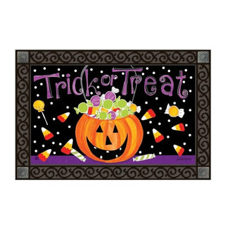 Halloween candy mat insert with orange jack-o-lantern and trick or treat text on black polka dot background