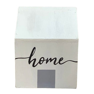 Minimalist farmhouse wooden house decor with off-white roof, cream body, and 'home' cursive script