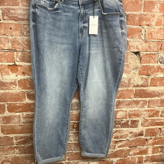 Judy Blue mid rise bleach wash boyfriend jeans with distressed texture and cuffed ankle hem
