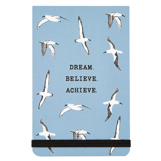 cream. believe. achieve. notebook
