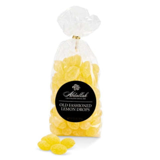 Abdallah Old Fashioned Lemon Drops in clear cellophane bag with gold twist tie and black label
