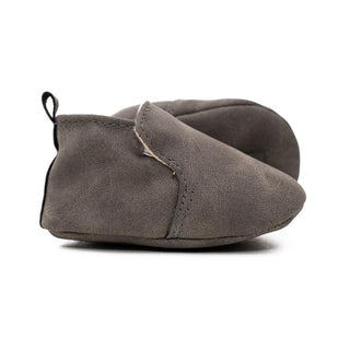 Dark gray suede baby loafers with elastic tongue and soft sole