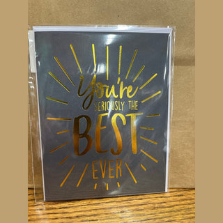 Dark gray serious best ever card with radiating gold foil lines and white border