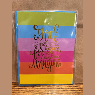 Rainbow stripe God has more in store card with large cursive gold script