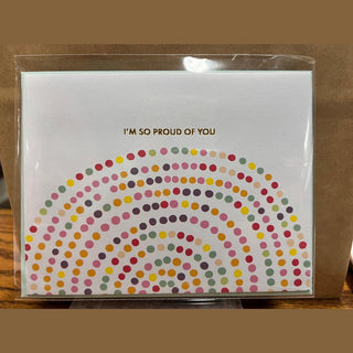 Proud of you card with multi-colored rainbow arch and gold foil text