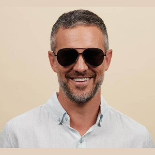 Men's black polarized aviator shades with matte finish and symmetrical fit