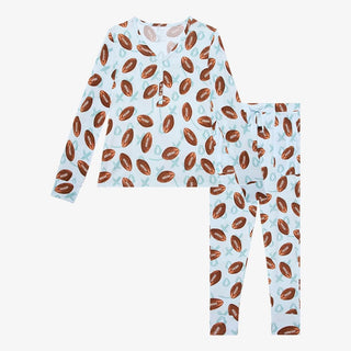 Two-piece Posh Peanut women's loungewear set featuring football and XO pattern henley top with matching joggers