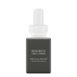Olive green Pura fragrance refill bottle white ribbed cap matte finish close-up