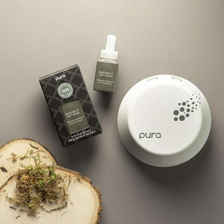 Pura Afternoon Retreat fragrance refill olive green bottle with diffuser base and moss styling