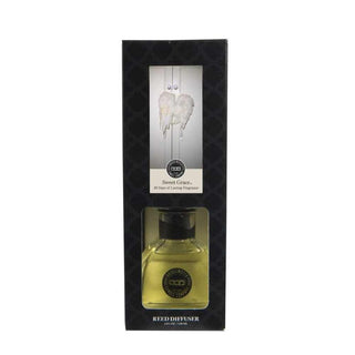 Sweet Grace Reed Diffuser in black patterned box with golden-yellow liquid and white feather wings packaging