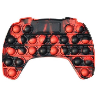 Red and black flame-patterned silicone pop-it controller toy with 24 tactile bubbles for anxiety relief