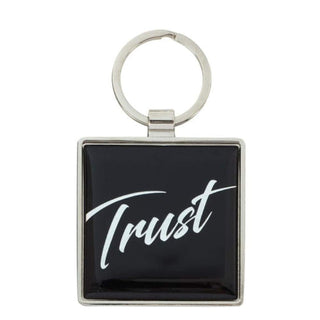 Keychain with 'Trust' text 