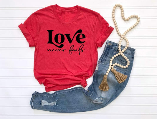 Love never fails tee